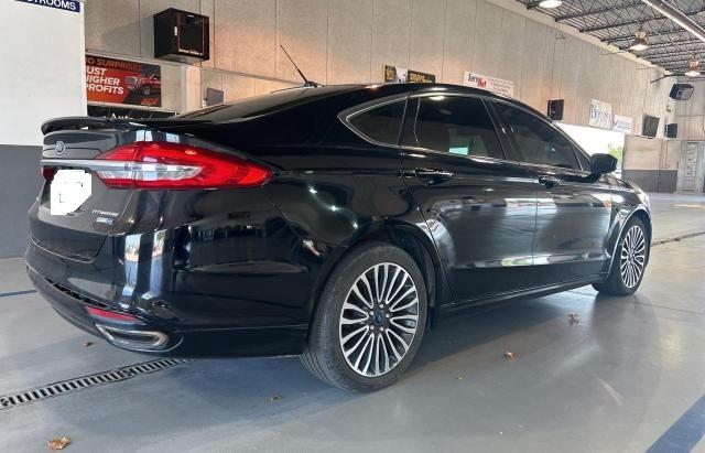Photo 4 from auction – 2018 FORD FUSION TIT with VIN 3FA6P0D96JR159241