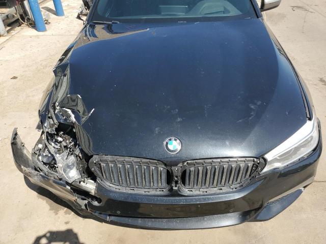 Photo 11 from auction – 2018 BMW M550XI with VIN WBAJB9C52JG464195