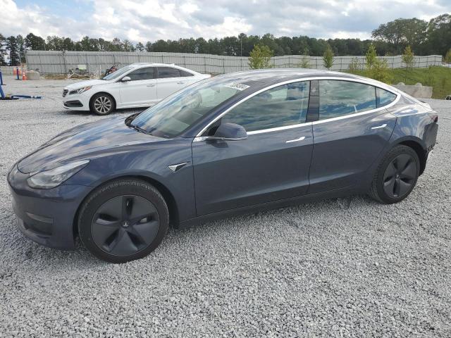 TESLA MODEL 3 2020 with VIN 5YJ3E1EA5LF644038 - Photo from auction