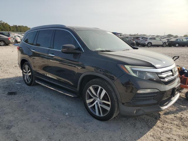 Photo 4 from auction – 2016 HONDA PILOT ELIT with VIN 5FNYF6H07GB117241