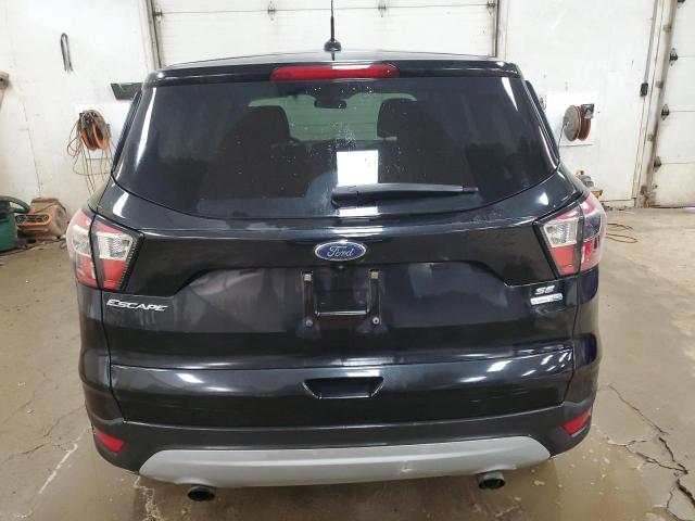 Photo 6 from auction – 2017 FORD ESCAPE SE with VIN 1FMCU9GD1HUD18871