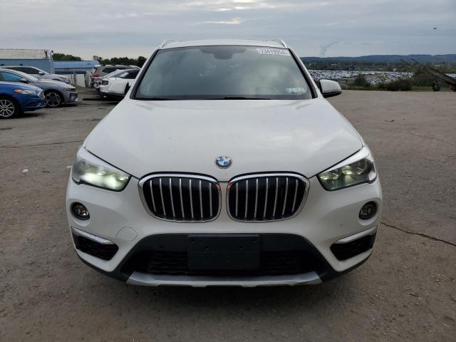 Photo 5 from auction – 2017 BMW X1 XDRIVE2 with VIN WBXHT3C3XH5F82646