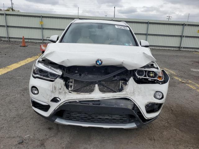 Photo 5 from auction – 2016 BMW X1 XDRIVE2 with VIN WBXHT3C34G5E55146