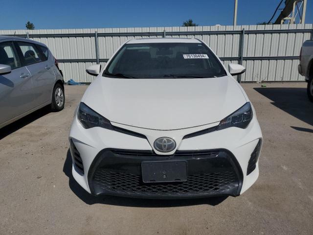 Photo 5 from auction – 2017 TOYOTA COROLLA L with VIN 5YFBURHE3HP620912