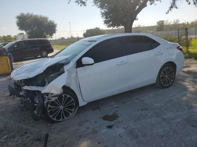 TOYOTA COROLLA L 2014 with VIN 2T1BURHE3EC105386 - Photo from auction