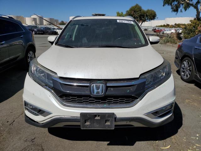 Photo 5 from auction – 2016 HONDA CR-V TOURI with VIN 5J6RM3H95GL021252