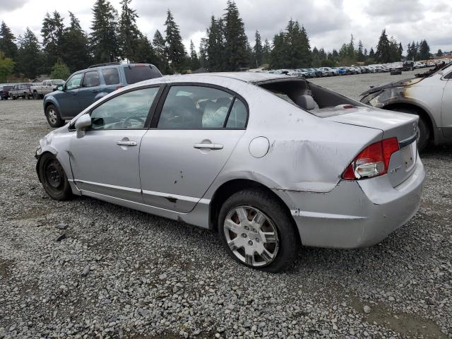 Photo 2 from auction – 2010 HONDA CIVIC LX with VIN 19XFA1F55AE063300