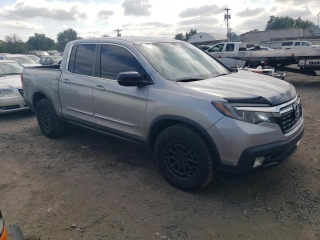 Photo 4 from auction – 2017 HONDA RIDGELINE with VIN 5FPYK3F22HB012257