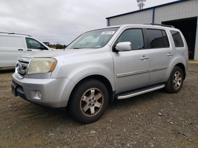 HONDA PILOT TOUR 2011 with VIN 5FNYF4H94BB011213 - Photo from auction