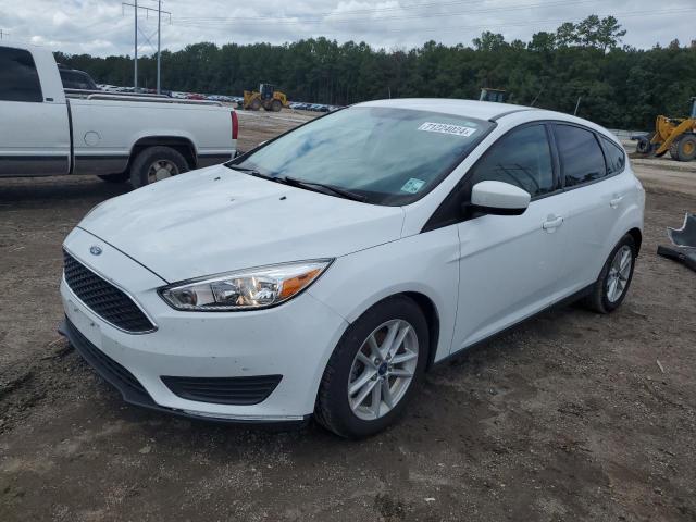 FORD FOCUS SE 2018 with VIN 1FADP3K25JL327061 - Photo from auction