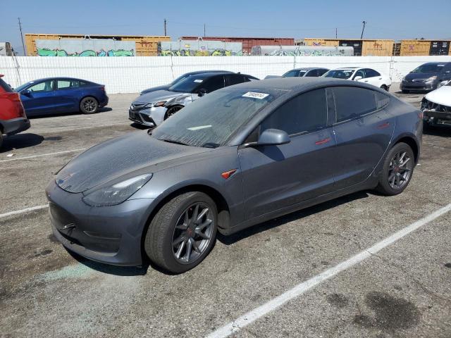 TESLA MODEL 3 2023 with VIN 5YJ3E1EA5PF497371 - Photo from auction