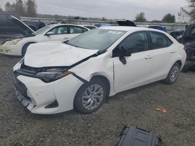 TOYOTA COROLLA L 2017 with VIN 5YFBURHE4HP613645 - Photo from auction