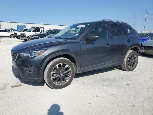 MAZDA CX-5 GT 2016 with VIN JM3KE2DY7G0698260 - Photo from auction
