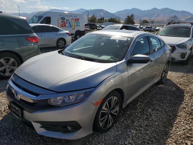 HONDA CIVIC EX 2016 with VIN 19XFC1F3XGE027247 - Photo from auction