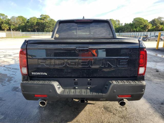 Photo 6 from auction – 2024 HONDA RIDGELINE with VIN 5FPYK3F88RB019977