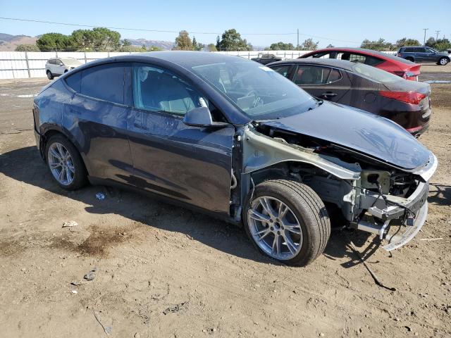 Photo 4 from auction – 2023 TESLA MODEL Y with VIN 7SAYGDED8PF972087