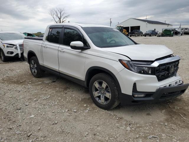 Photo 4 from auction – 2024 HONDA RIDGELINE with VIN 5FPYK3F55RB017416