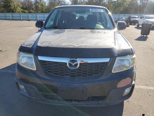 Photo 5 from auction – 2011 MAZDA TRIBUTE I with VIN 4F2CY0C73BKM02889