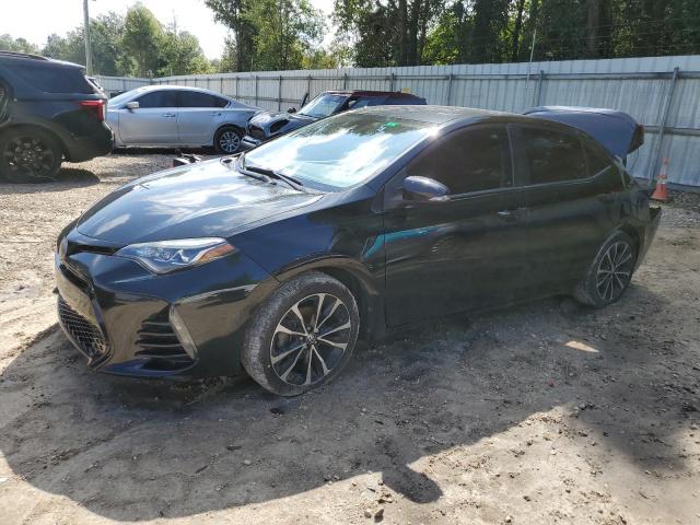 TOYOTA COROLLA L 2017 with VIN 2T1BURHE9HC755103 - Photo from auction