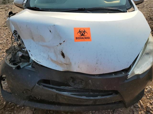 Photo 11 from auction – 2014 TOYOTA PRIUS C with VIN JTDKDTB35E1569613