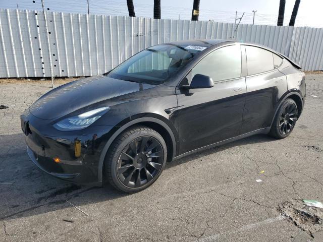 TESLA MODEL Y 2021 with VIN 5YJYGDEE0MF097749 - Photo from auction