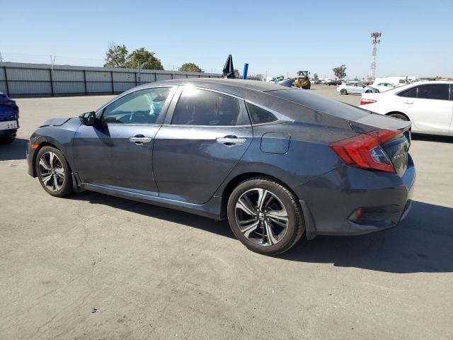 Photo 2 from auction – 2016 HONDA CIVIC TOUR with VIN 19XFC1F94GE221163