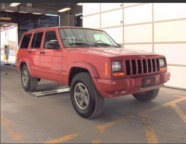 JEEP CHEROKEE S 1999 with VIN 1J4FT68S5XL540201 - Photo from auction