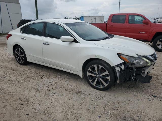 Photo 4 from auction – 2016 NISSAN ALTIMA 2.5 with VIN 1N4AL3AP4GC271182
