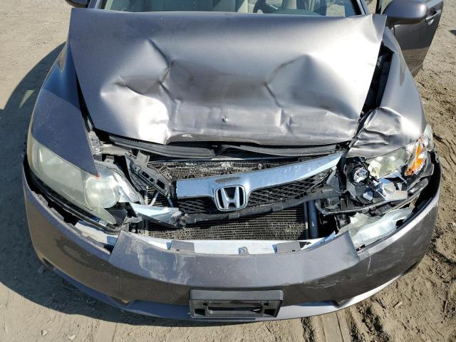 Photo 11 from auction – 2010 HONDA CIVIC LX with VIN 19XFA1F57AE063041