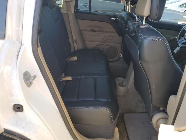 Photo 11 from auction – 2014 JEEP COMPASS SP with VIN 1C4NJCBA7ED685219