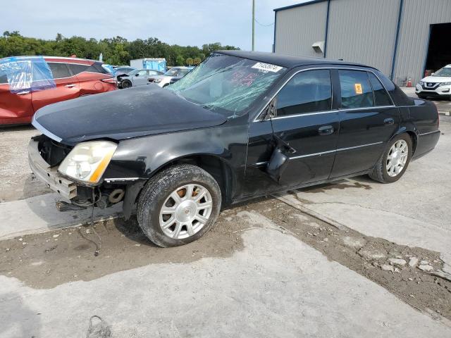CADILLAC DTS 2010 with VIN 1G6KA5EY1AU116600 - Photo from auction