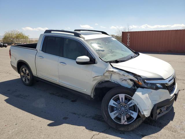 Photo 4 from auction – 2017 HONDA RIDGELINE with VIN 5FPYK3F72HB027515