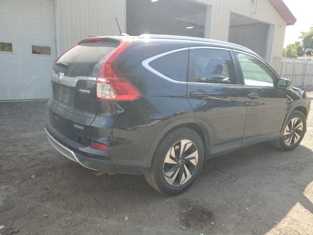 Photo 3 from auction – 2016 HONDA CR-V TOURI with VIN 5J6RM4H96GL065623