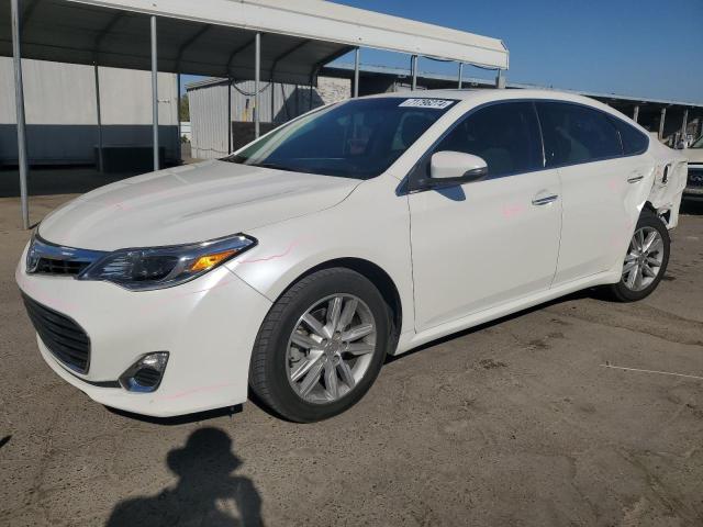 TOYOTA AVALON BAS 2014 with VIN 4T1BK1EB0EU093052 - Photo from auction