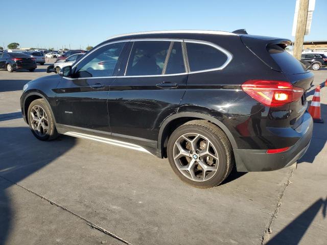 Photo 2 from auction – 2016 BMW X1 XDRIVE2 with VIN WBXHT3C30G5E56665