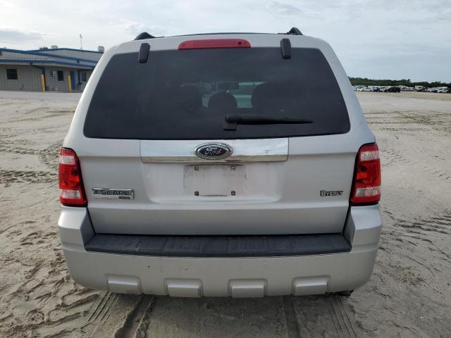Photo 6 from auction – 2009 FORD ESCAPE LIM with VIN 1FMCU04709KB41012