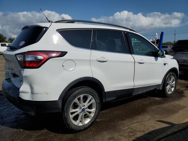 Photo 3 from auction – 2018 FORD ESCAPE SE with VIN 1FMCU0GD4JUC57324