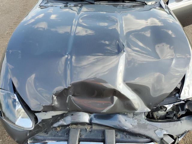 Photo 11 from auction – 2004 JAGUAR XK8 with VIN SAJDA42C642A38070