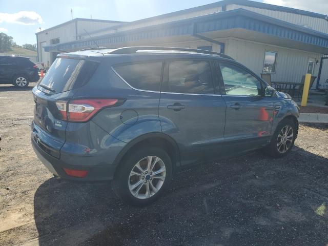 Photo 3 from auction – 2018 FORD ESCAPE SE with VIN 1FMCU0GD2JUC11541