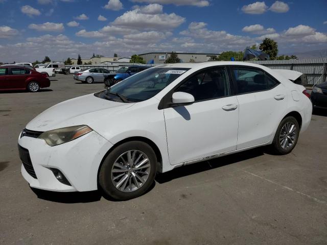 TOYOTA COROLLA L 2015 with VIN 5YFBURHE3FP216506 - Photo from auction