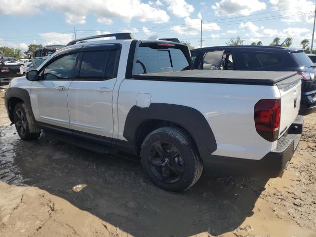Photo 2 from auction – 2023 HONDA RIDGELINE with VIN 5FPYK3F83PB056416