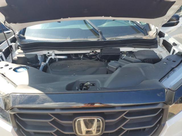 Photo 11 from auction – 2023 HONDA RIDGELINE with VIN 5FPYK3F83PB056416