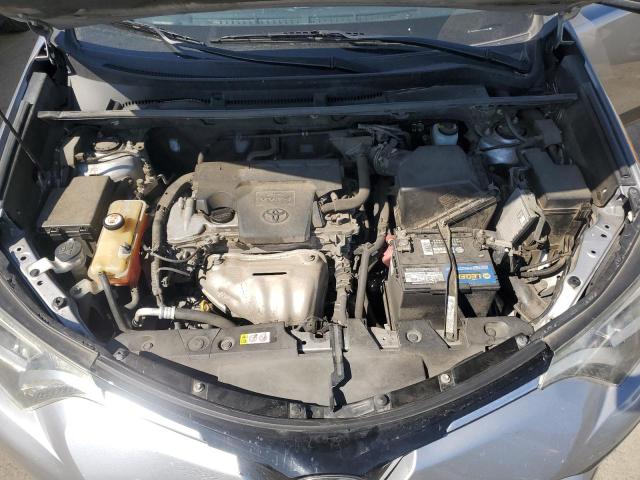 Photo 12 from auction – 2018 TOYOTA RAV4 LE with VIN JTMZFREV2JD129348