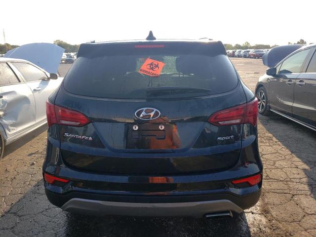 Photo 6 from auction – 2018 HYUNDAI SANTA FE S with VIN 5NMZU3LB6JH052888