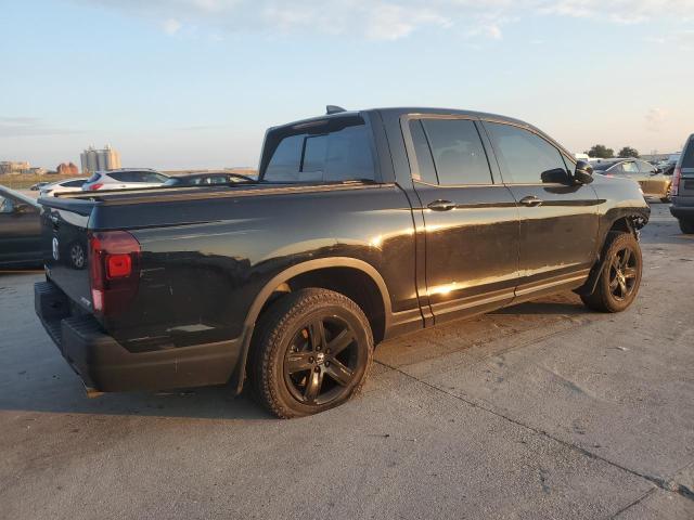 Photo 3 from auction – 2022 HONDA RIDGELINE with VIN 5FPYK3F81NB011035