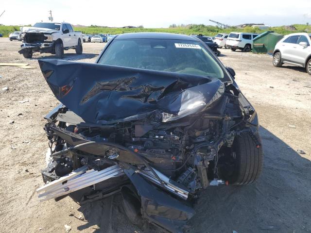 Photo 5 from auction – 2023 TOYOTA COROLLA SE with VIN 5YFS4MCE1PP146659