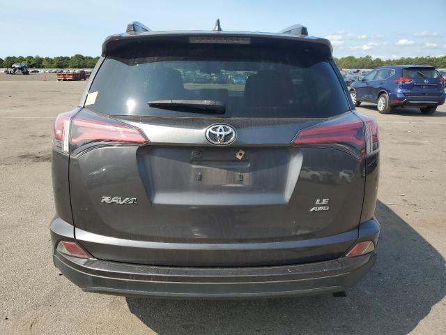 Photo 6 from auction – 2018 TOYOTA RAV4 LE with VIN JTMBFREV6JJ741930