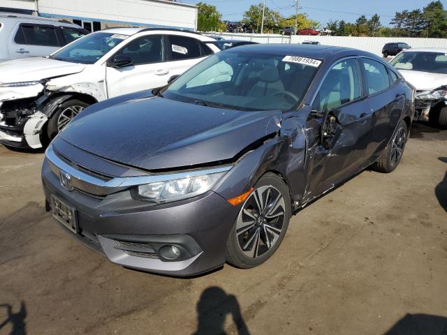 Photo 1 from auction – 2017 HONDA CIVIC EX with VIN 19XFC1F33HE206571