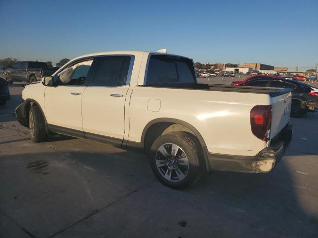 Photo 2 from auction – 2018 HONDA RIDGELINE with VIN 5FPYK3F76JB015194