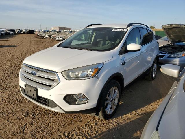 FORD ESCAPE SE 2018 with VIN 1FMCU9GD4JUA91567 - Photo from auction